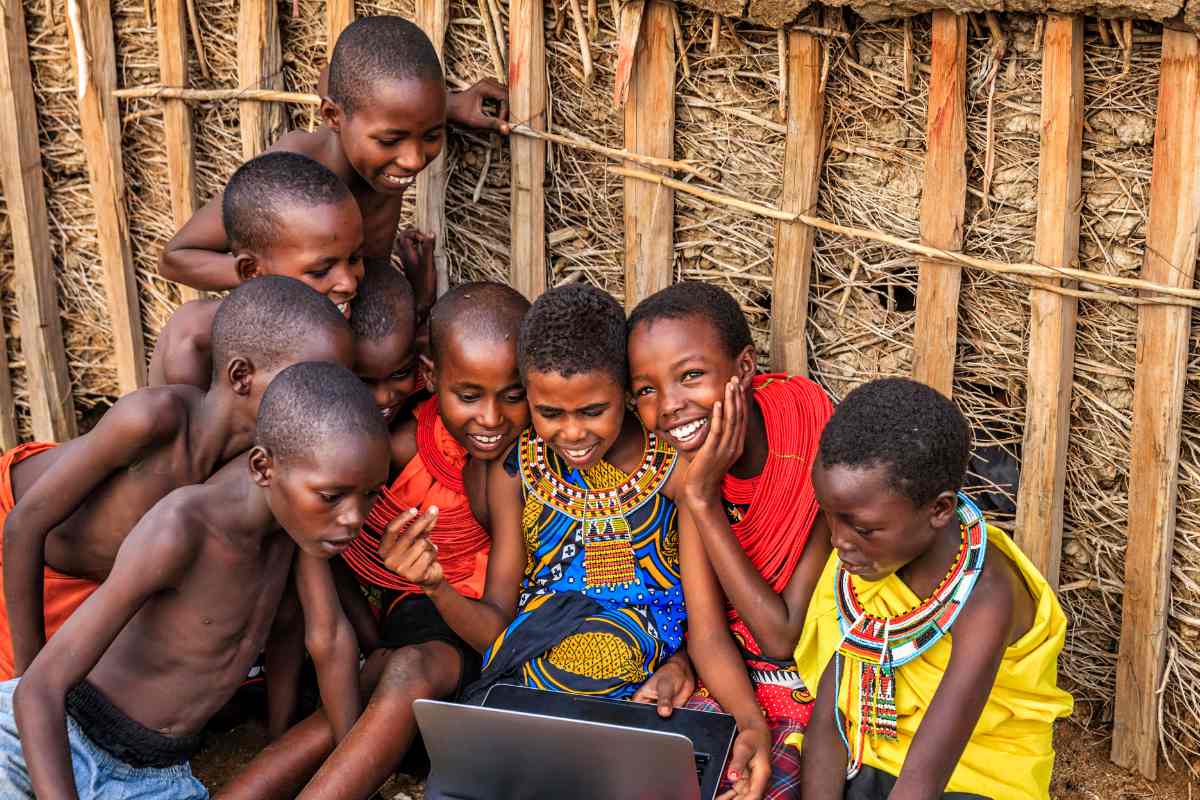Children learning with computer in Tanzania